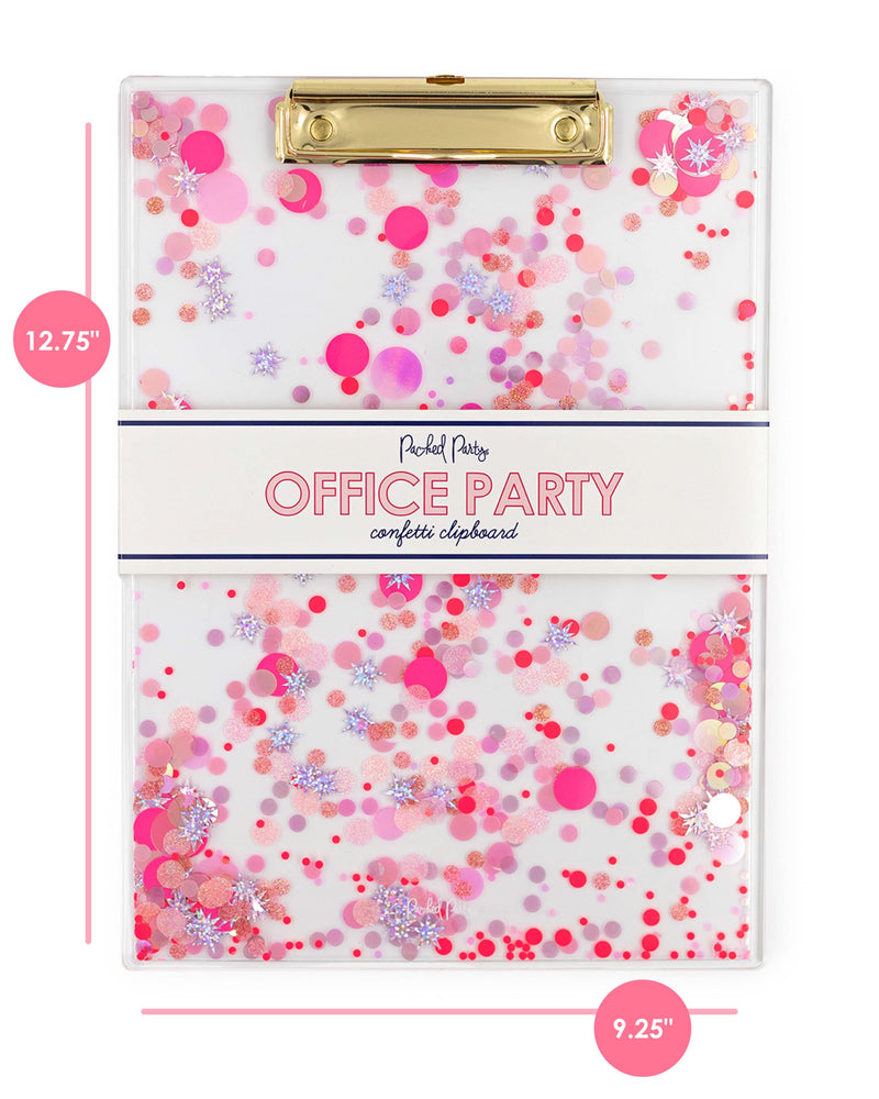 A clear acrylic clipboard with pink confetti trapped inside and gold hardware sits on a white background. The label reads, "Packed Party Office Party Confetti Clipboard." To the left of the clipboard, the dimensions read "12.75." On the bottom of the clipboard the dimension reads 9.25".