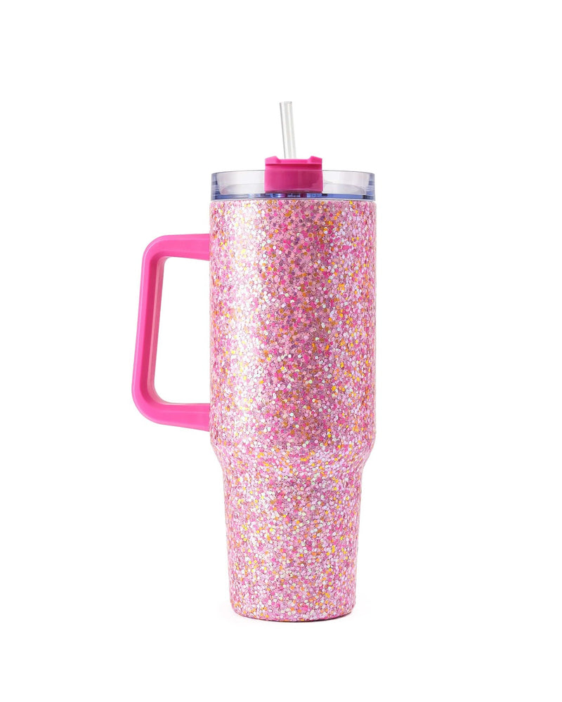 A pink glitter stainless steel tumbler stands against a white background.