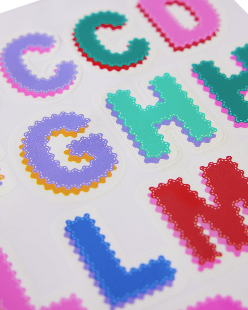 Close up of Alphabet Stickers in various colors. 