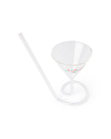 Upward view of 'A Tini Bit Naughty' martini glass shot against white background. 