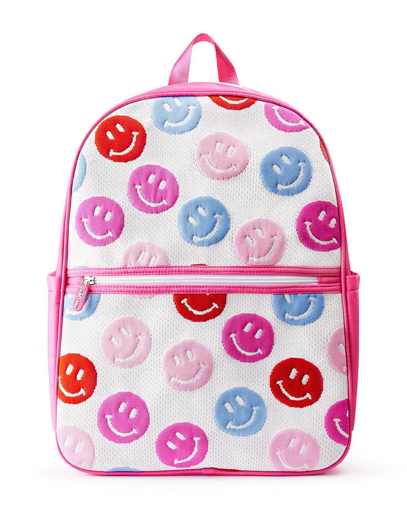 Pink and white knit backpack with red, blue, pink and purple smiley faces on the exterior. 