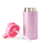 Pink glitter water bottle with lid and straw lying next to it. 